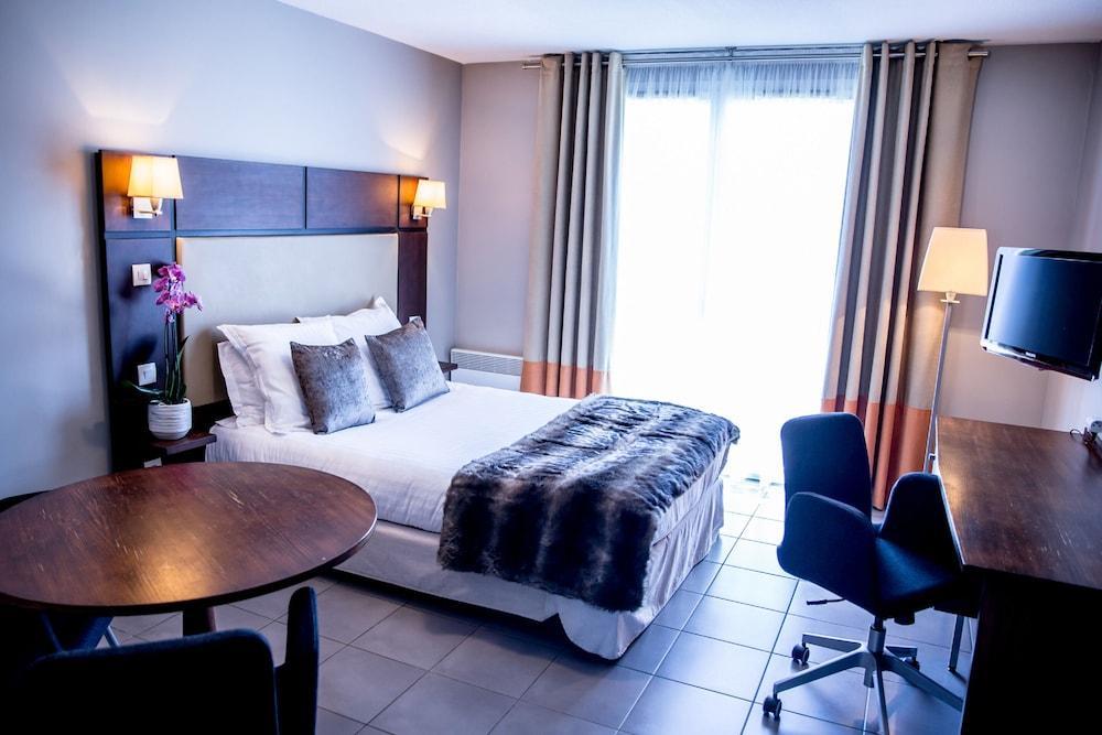 โฮเต็ล เรสซิเดนซ์ บราสเซอรี เล แป็ง กาล็องต์ Aparthotel ตูร์เนเฟย ภายนอก รูปภาพ